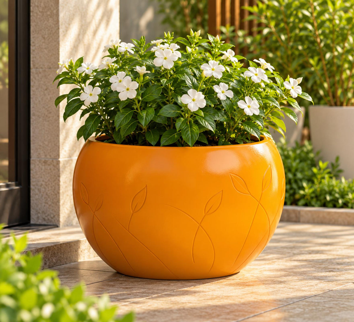 Botanical Orb Outdoor Planter – Amber Orange - Lifestyle